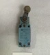Telemecanique XCK-J series limit switch with a roller lever actuator, ZCK-E05
